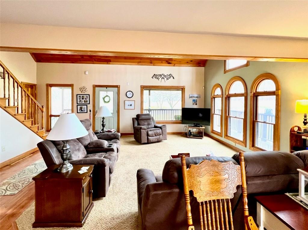 84 Mc Ewen Road Mercer, PA 16137 - Photo 4 of 18 a living room with furniture fireplace and a large window