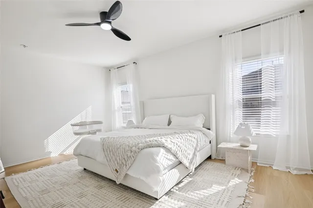 a kitchen with granite countertop a refrigerator and a sink