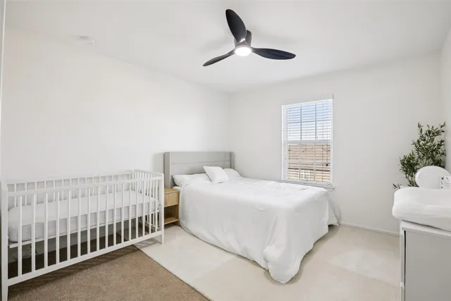 a bathroom with a sink toilet and mirror