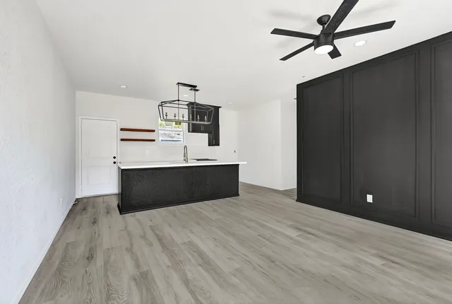a view of kitchen with wooden floor