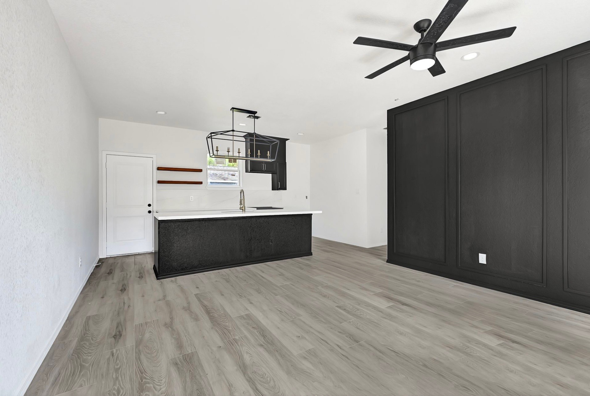 7939 Goode Street Houston, TX 77012 - Photo 3 of 14 a view of kitchen with wooden floor