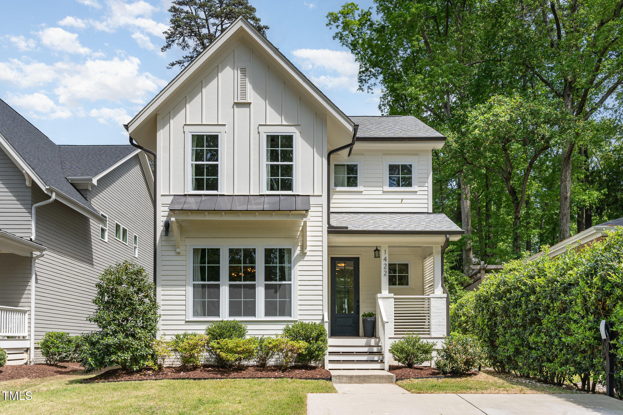 1422 Banbury Road Raleigh, NC 27607 - Photo 1 of 48 front view of a house with a yard