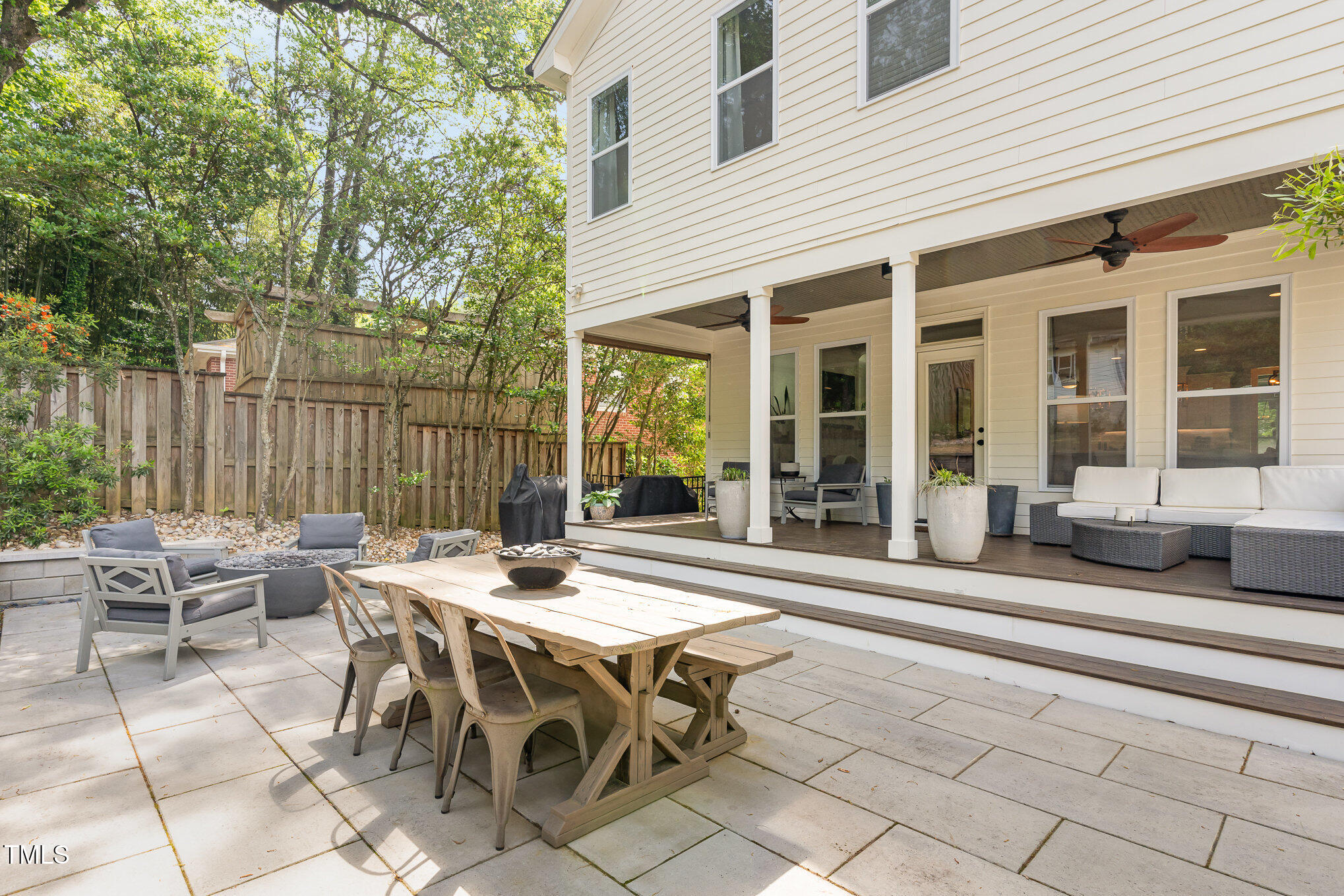 1422 Banbury Road Raleigh, NC 27607 - Photo 26 of 48 a view of a dinning table and chairs in the patio