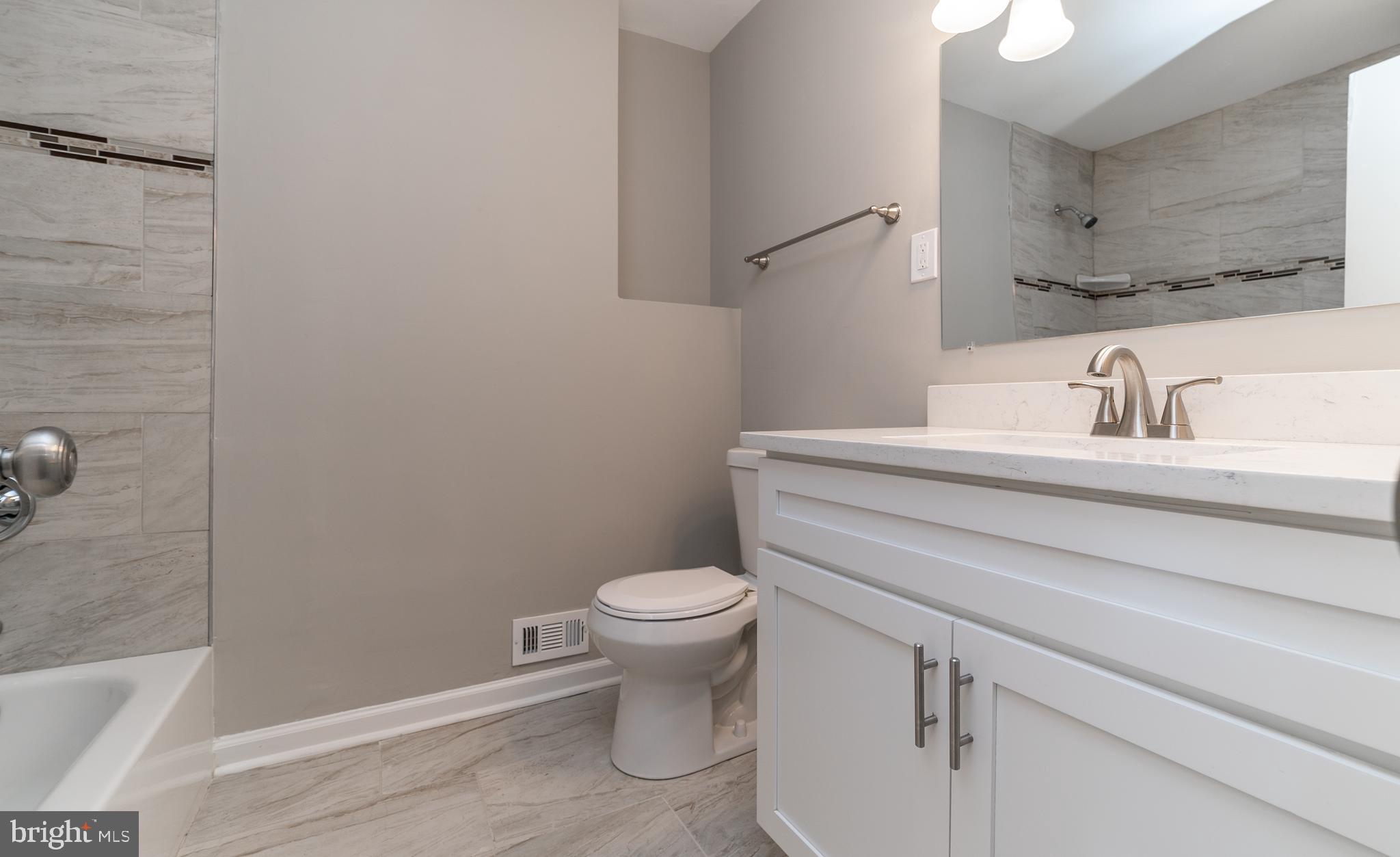 5303 Whitfield Chapel Road Lanham, MD 20706 - Photo 8 of 35 Main Level Full Bathroom