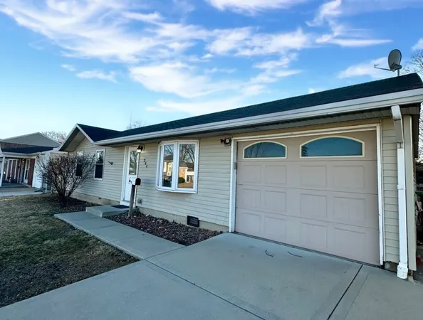 front view of house with a yard