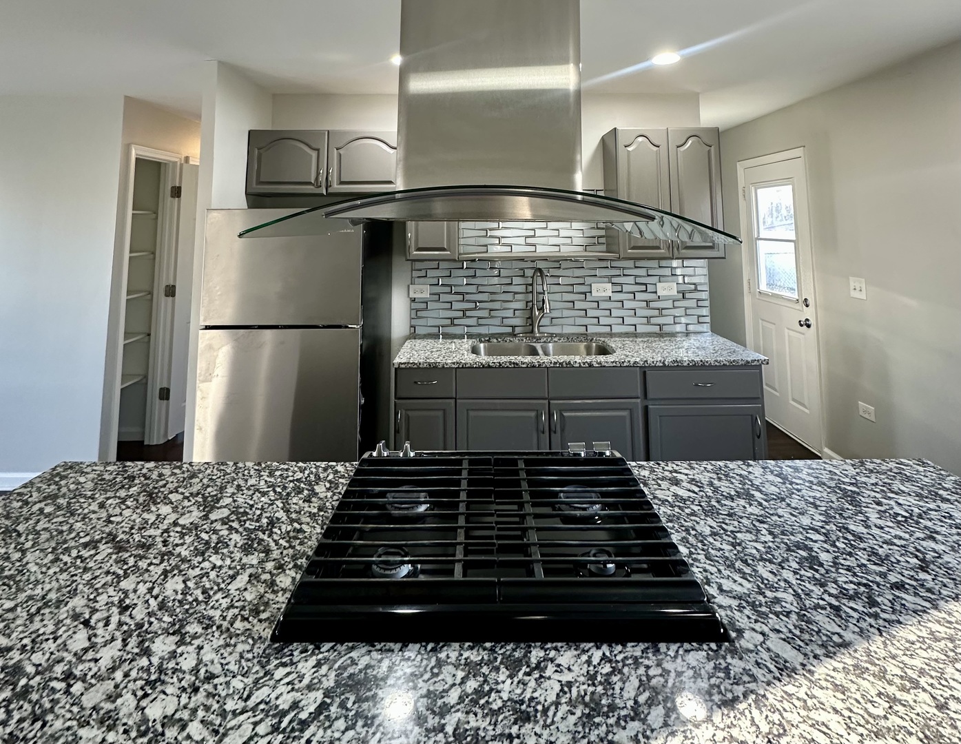 344 Hickory Avenue Romeoville, IL 60446 - Photo 5 of 14 a closeup of a stove top oven sitting inside of a kitchen