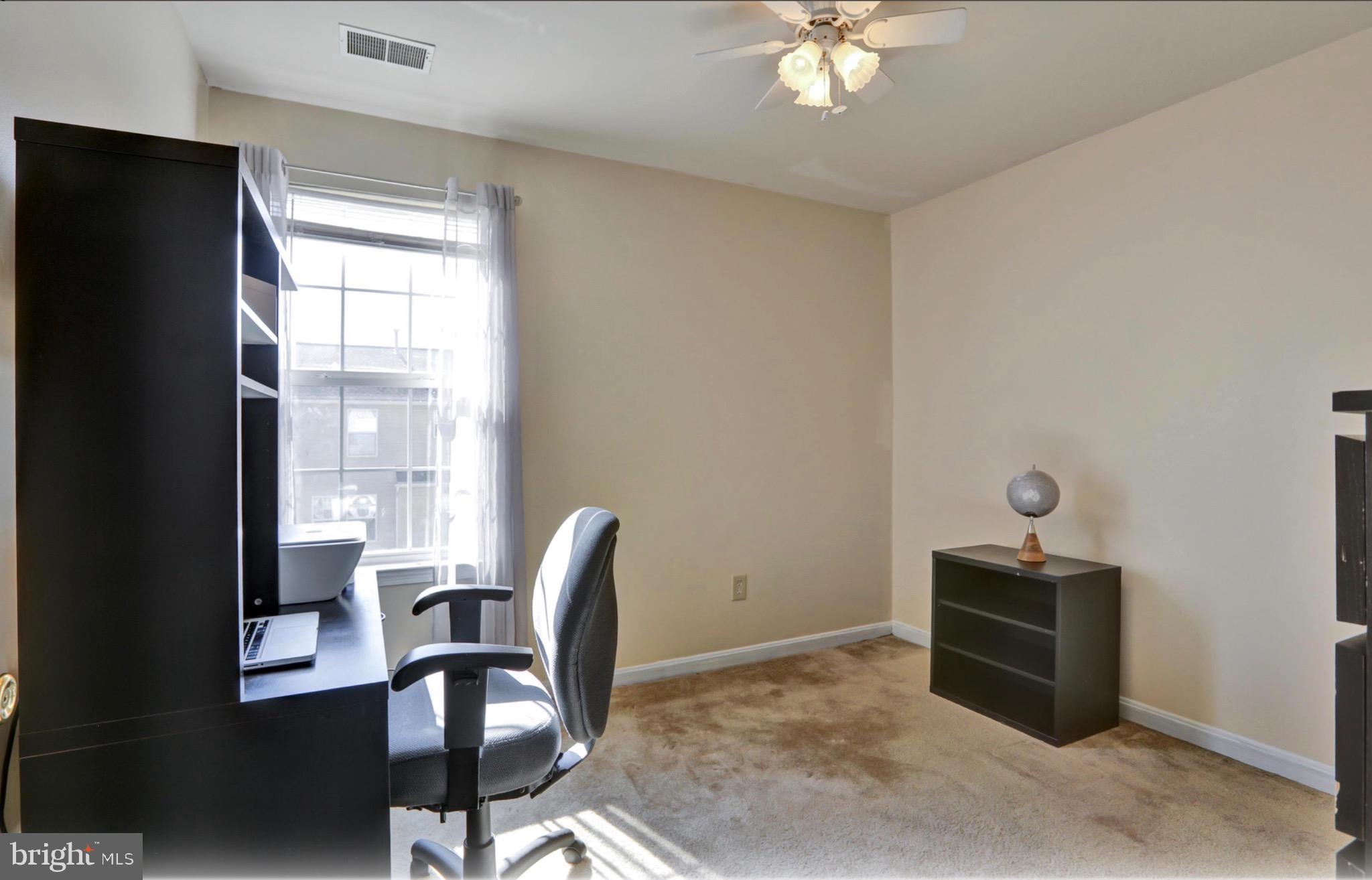 4305 Silver Spring Road Perry Hall, MD 21236 - Photo 18 of 29 a living room with furniture and a window