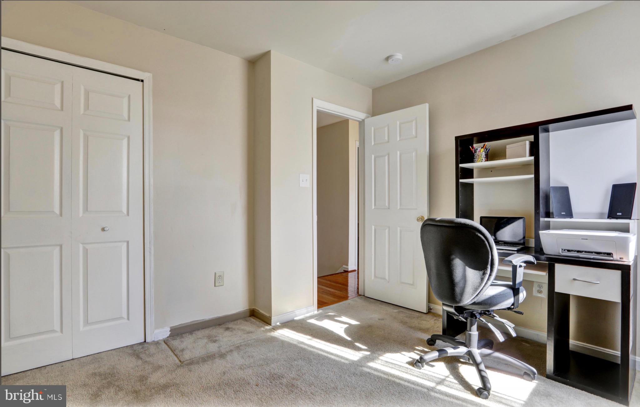 4305 Silver Spring Road Perry Hall, MD 21236 - Photo 20 of 29 a view of a workspace with furniture and a window