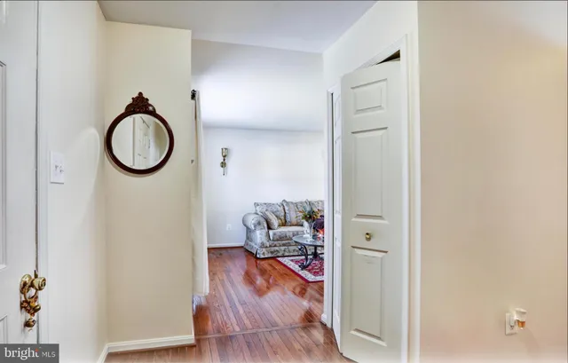 a very nice looking room with wooden floor