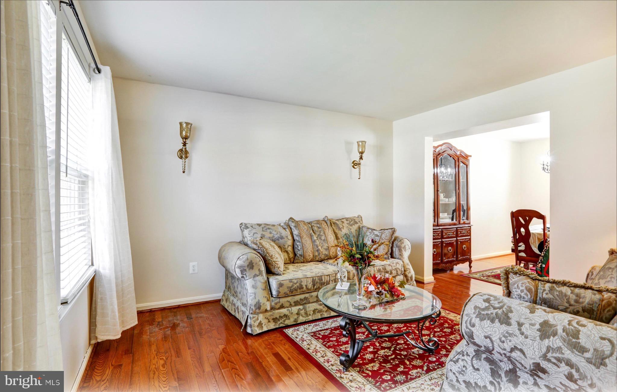 4305 Silver Spring Road Perry Hall, MD 21236 - Photo 7 of 29 a living room with furniture and a window