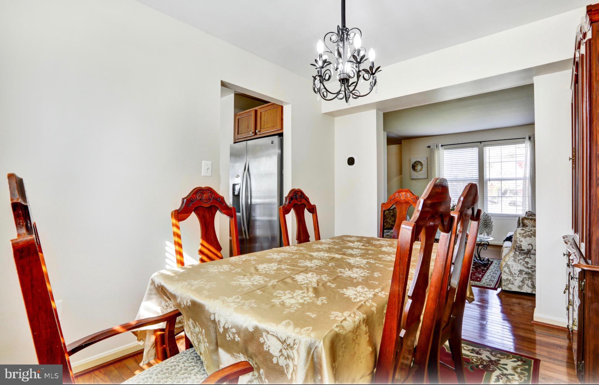 4305 Silver Spring Road Perry Hall, MD 21236 - Photo 8 of 29 a view of a dining room with furniture