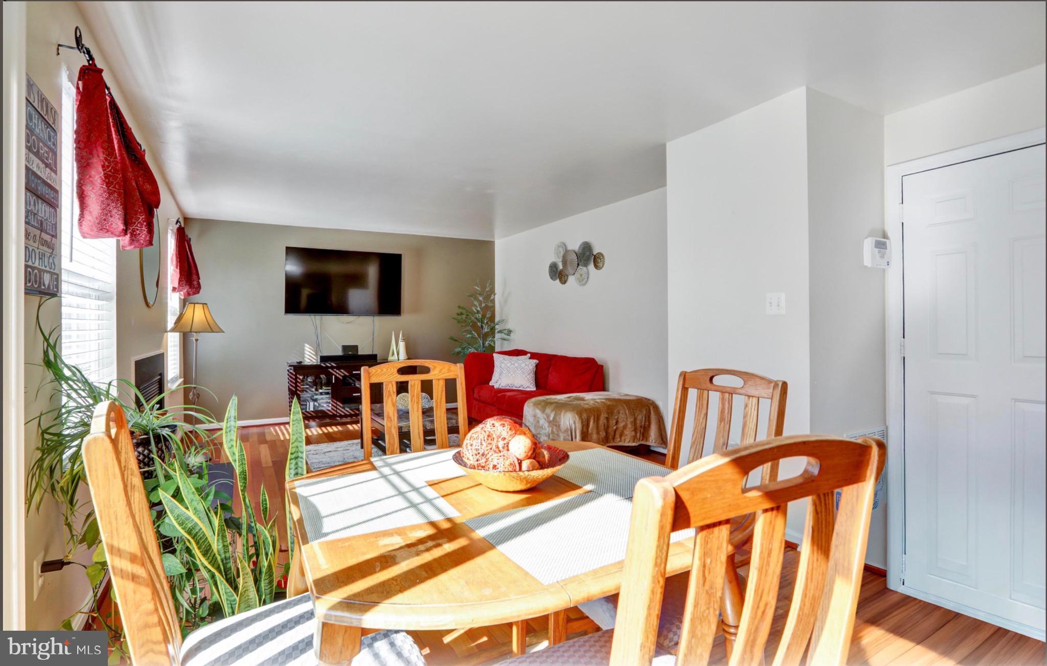4305 Silver Spring Road Perry Hall, MD 21236 - Photo 10 of 29 a living room with furniture and a flat screen tv