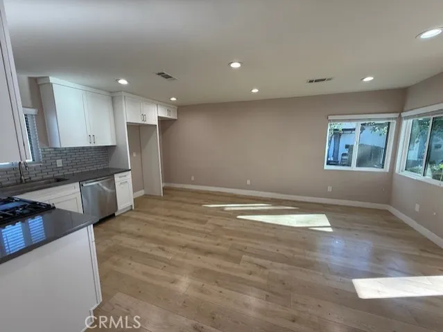 a view of a kitchen with a sink