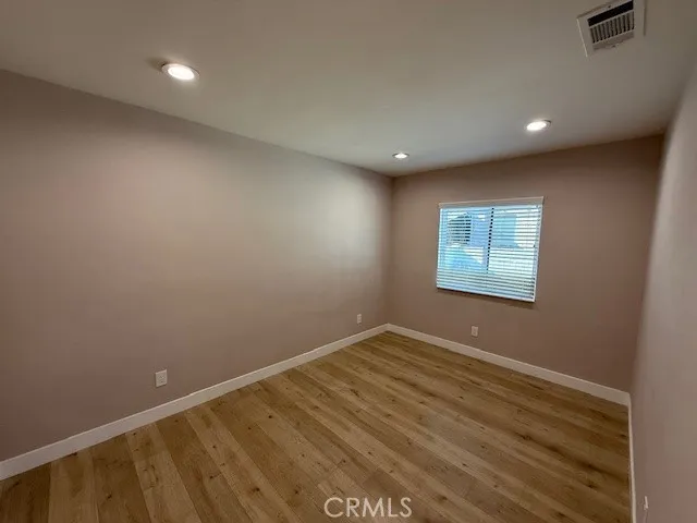 an empty room with a empty space and window