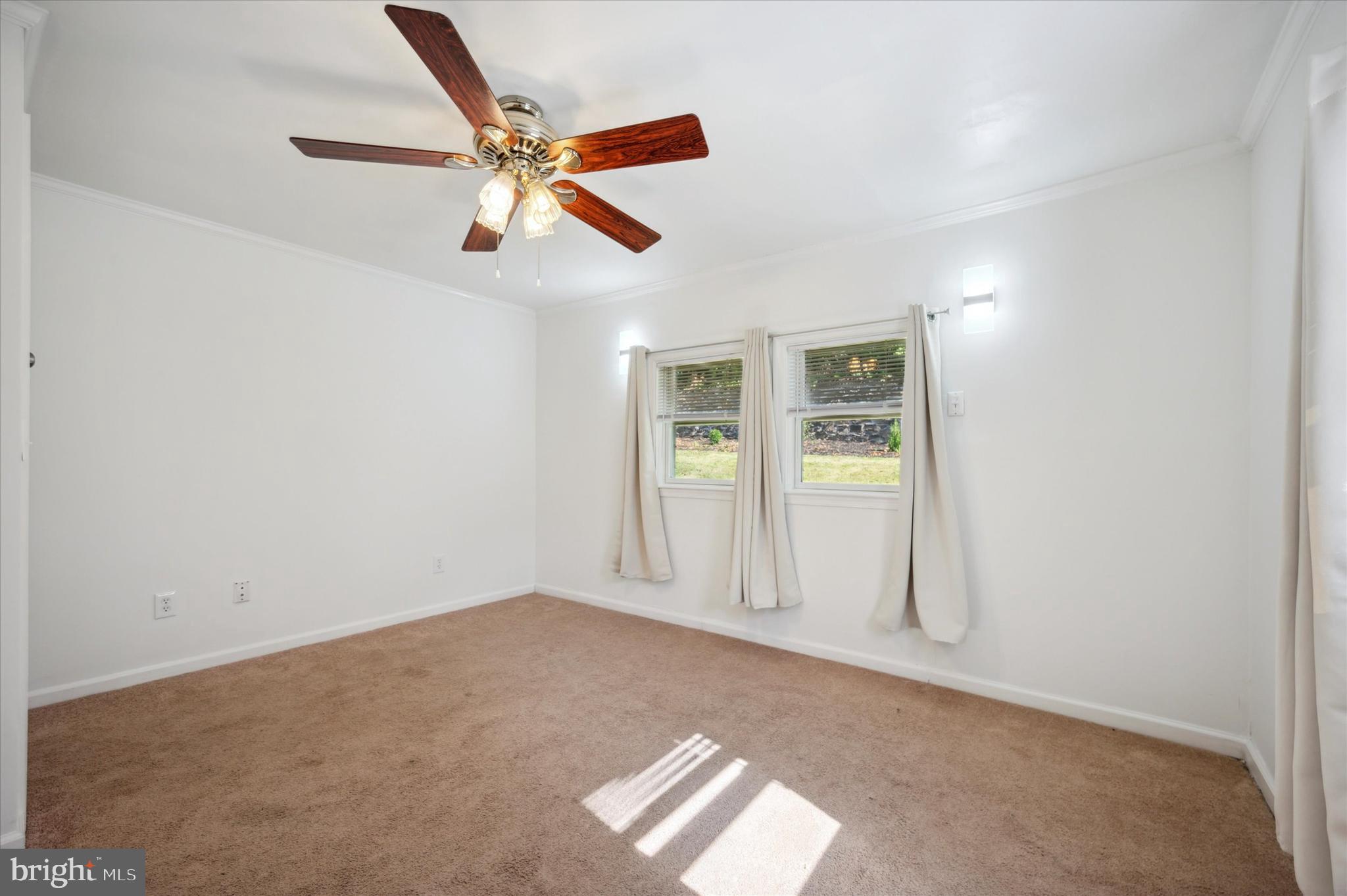 907 Powder Mill Lane Wynnewood, PA 19096 - Photo 17 of 31 an empty room with closet and windows