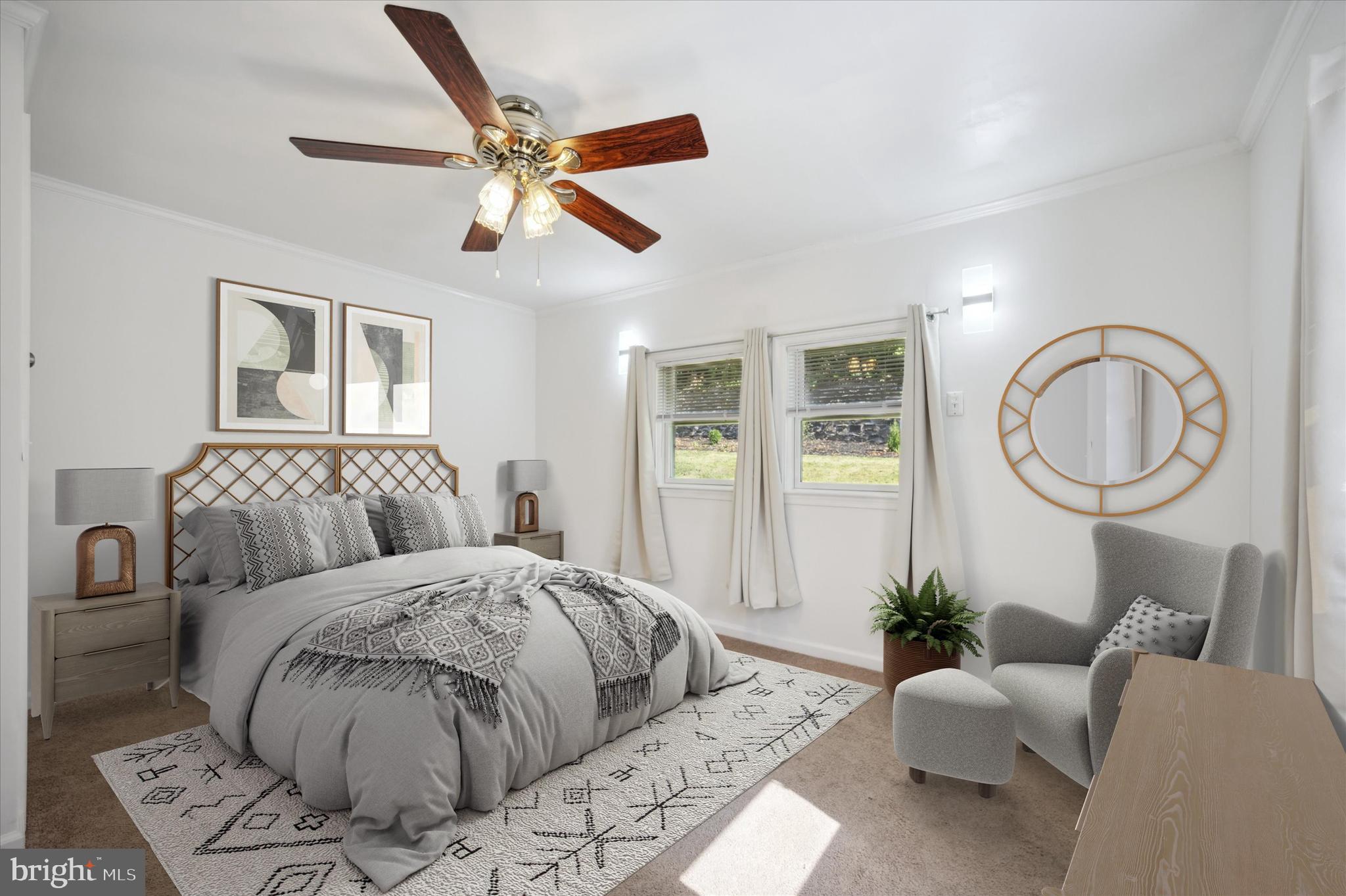 907 Powder Mill Lane Wynnewood, PA 19096 - Photo 18 of 31 a living room with furniture a clock potted plant and a large window