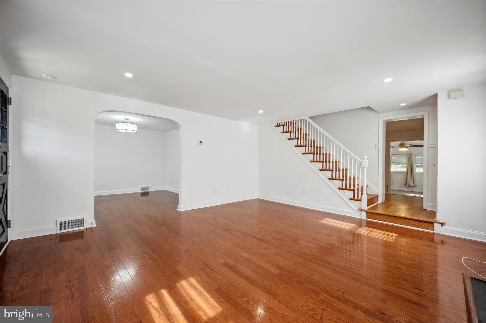 907 Powder Mill Lane Wynnewood, PA 19096 - Photo 5 of 31 a view of empty room with wooden floor