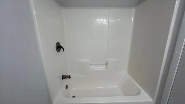 a close view of a bathtub in bathroom