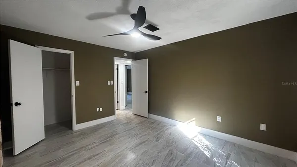 a bathroom with a sink toilet tub and shower