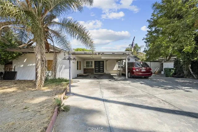 a car parked in front of a house