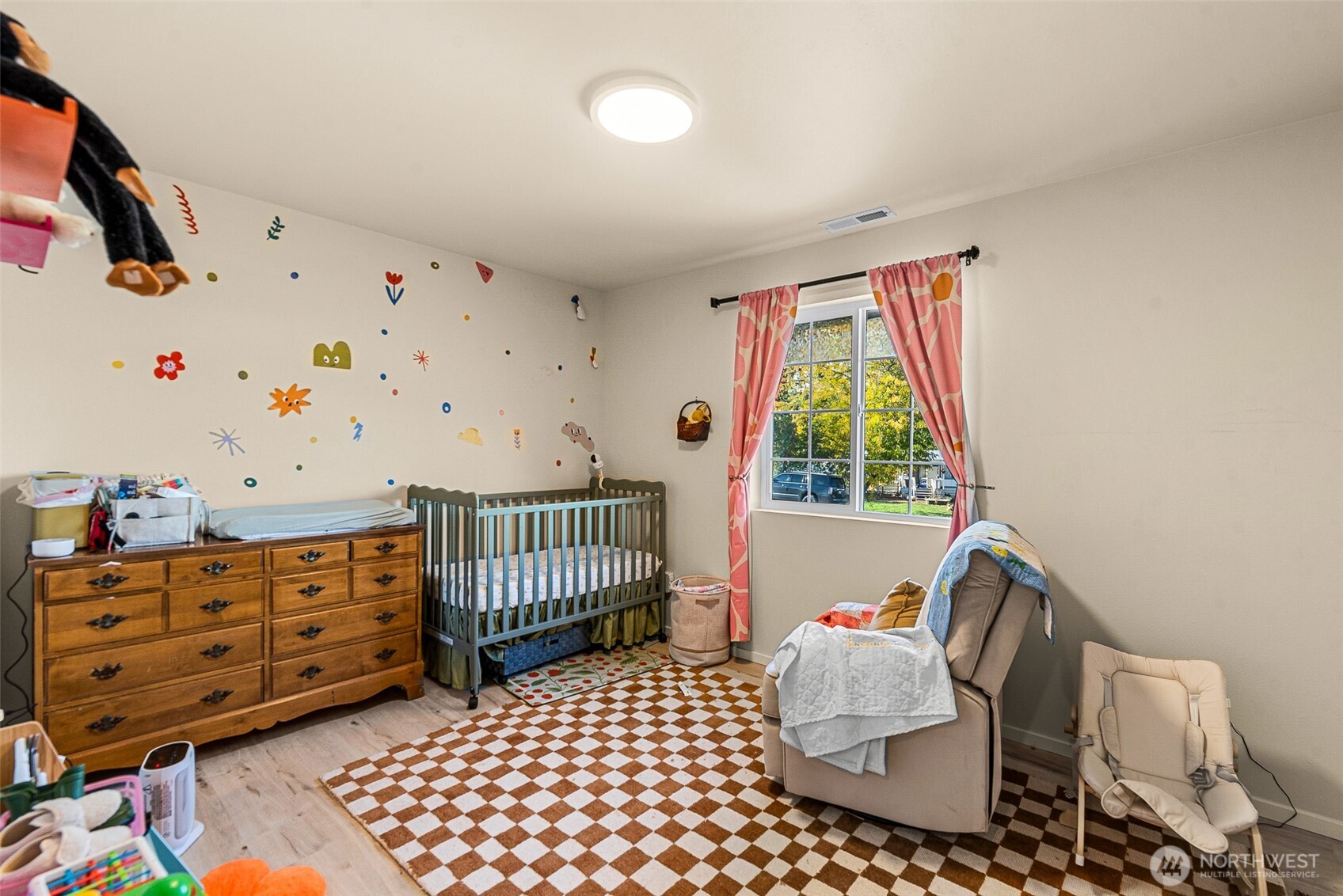 3577 Bainard Road Malaga, WA 98828 - Photo 15 of 39 a bedroom with furniture and a window