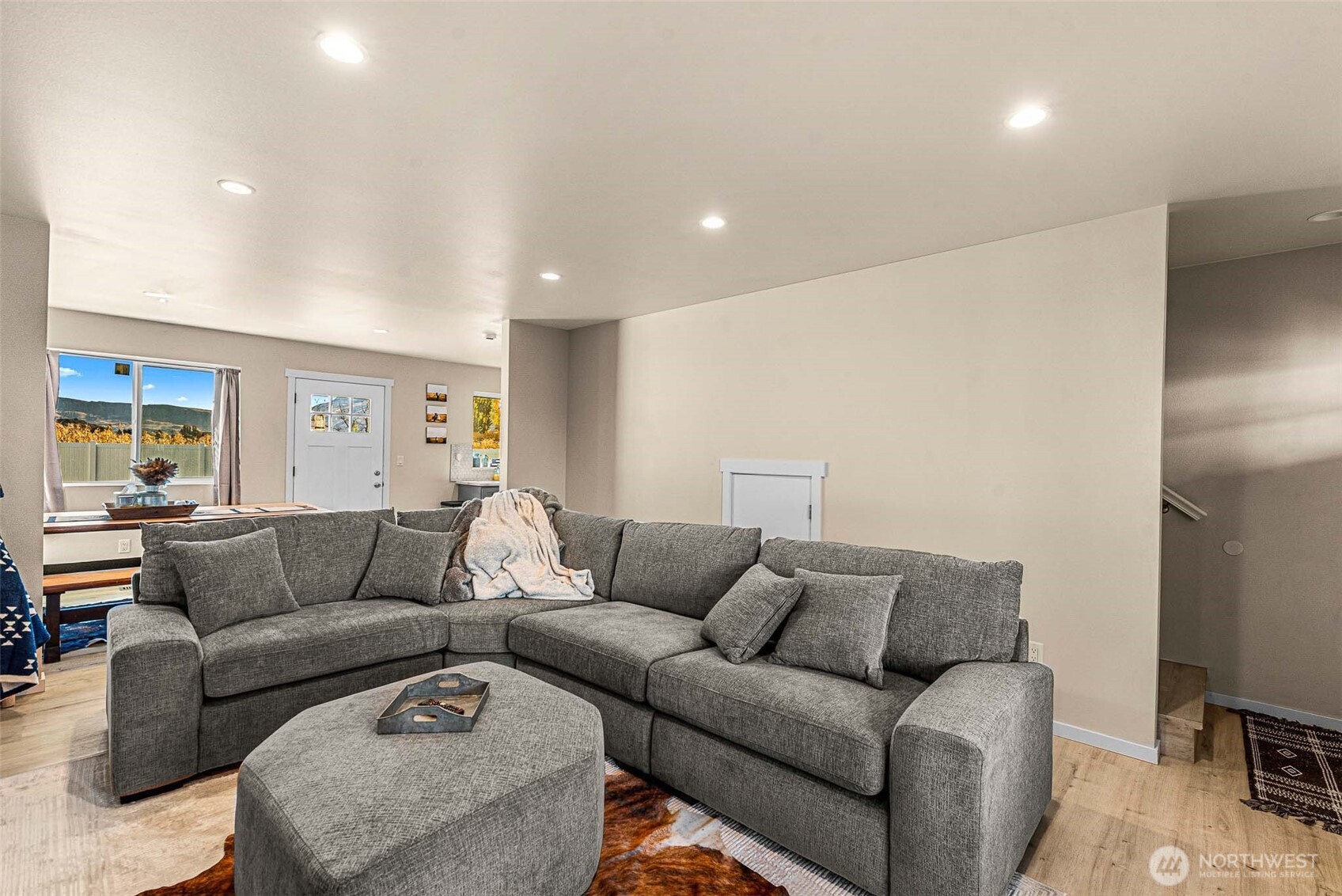 3577 Bainard Road Malaga, WA 98828 - Photo 22 of 39 a living room with furniture and a couch