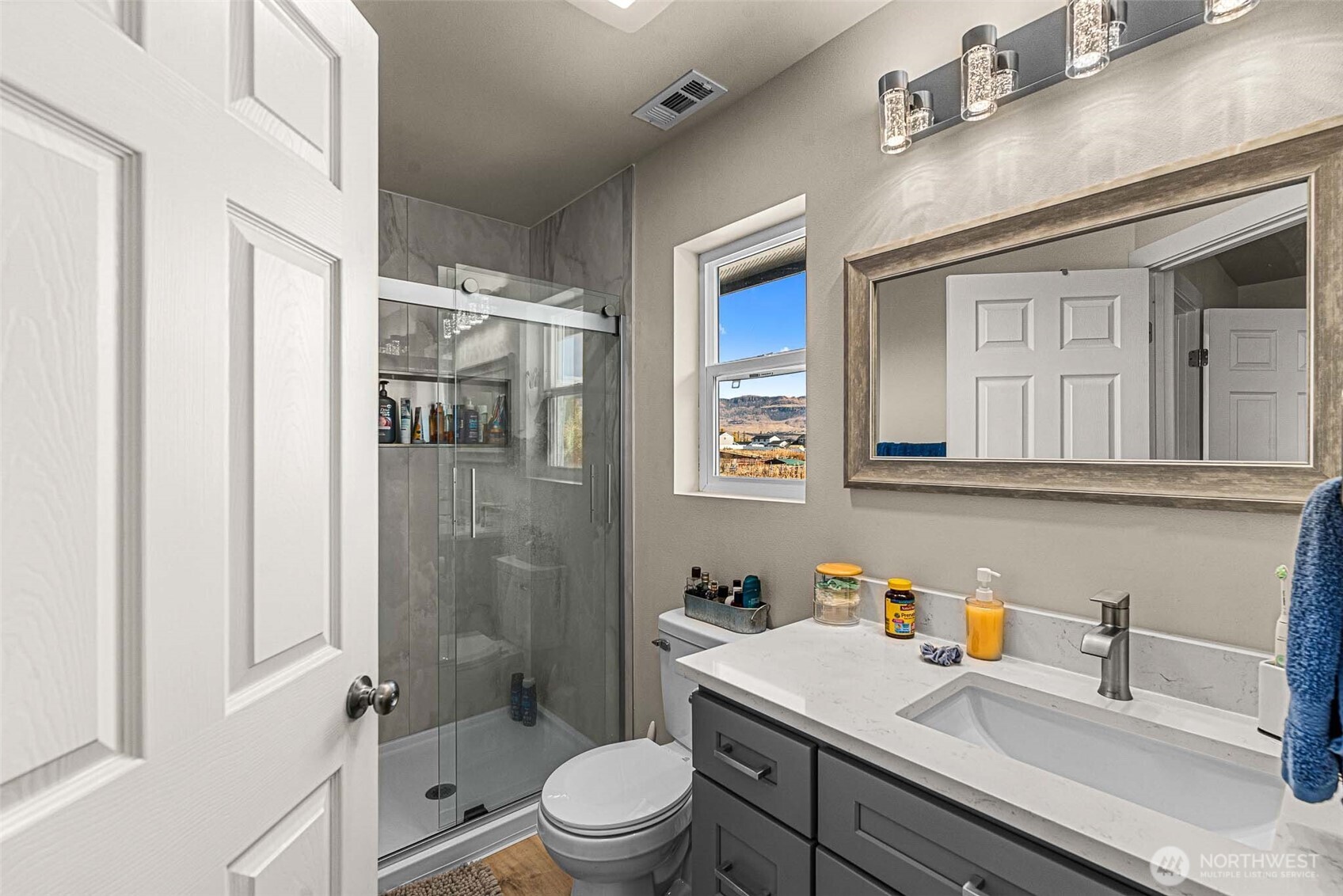 3577 Bainard Road Malaga, WA 98828 - Photo 30 of 39 a bathroom with a sink a toilet and shower