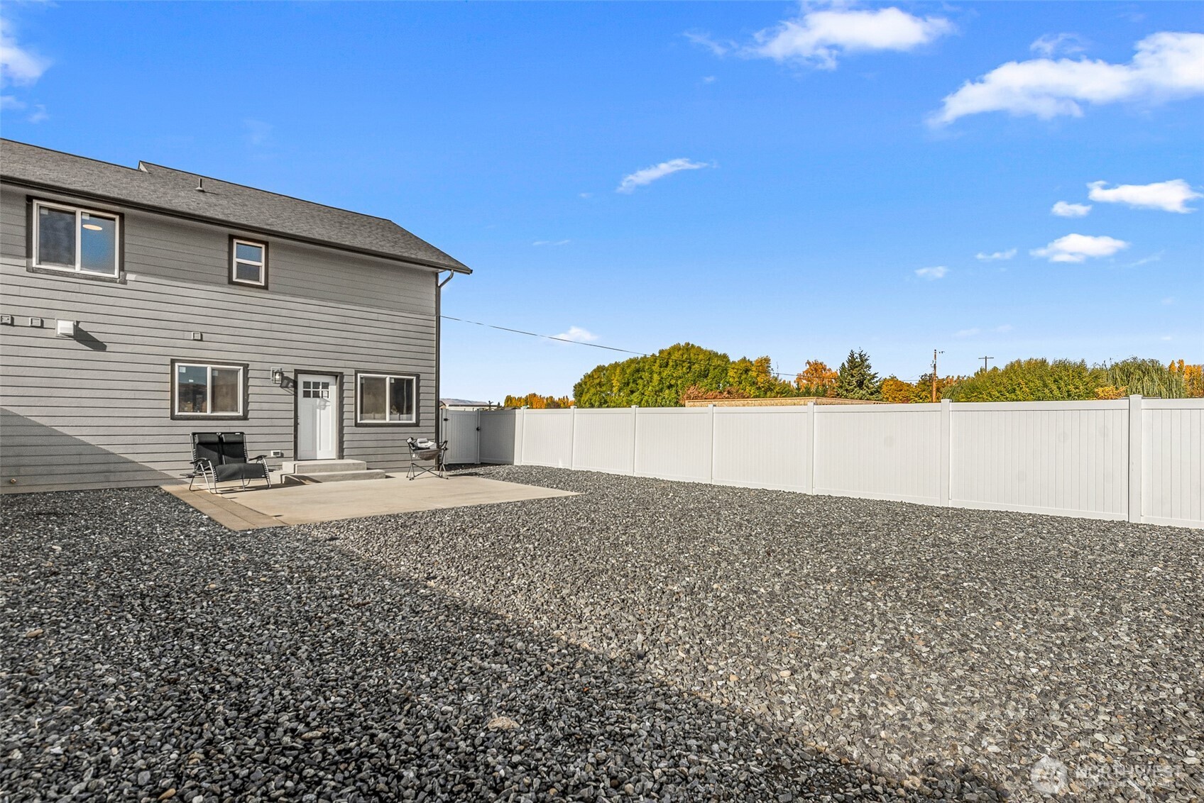 3577 Bainard Road Malaga, WA 98828 - Photo 37 of 39 a view of a house with a yard and lake view