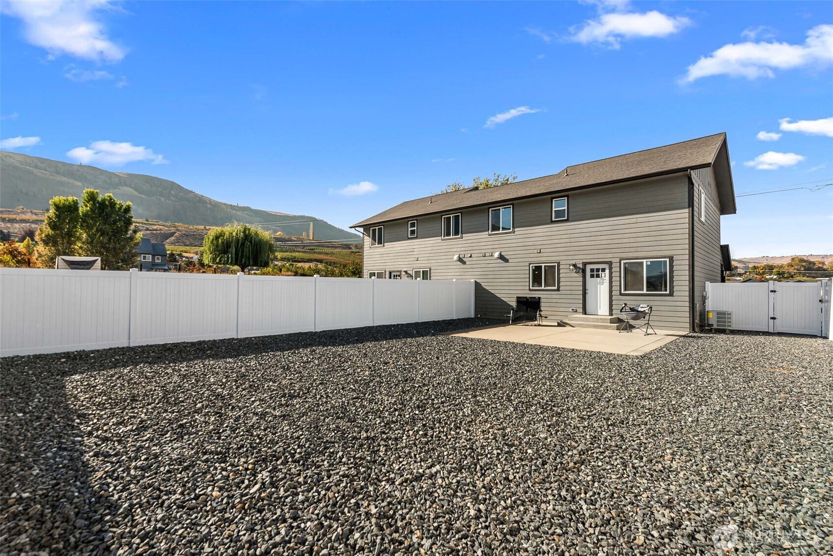 3577 Bainard Road Malaga, WA 98828 - Photo 38 of 39 a front view of a house with a yard