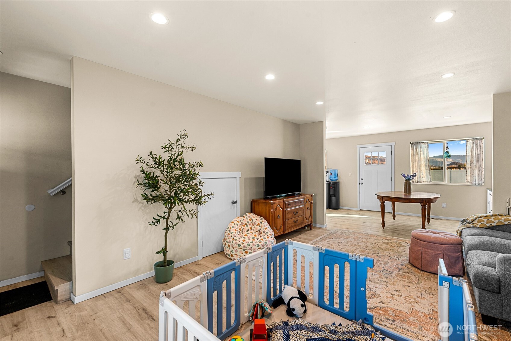 3577 Bainard Road Malaga, WA 98828 - Photo 5 of 39 a living room with furniture and a flat screen tv
