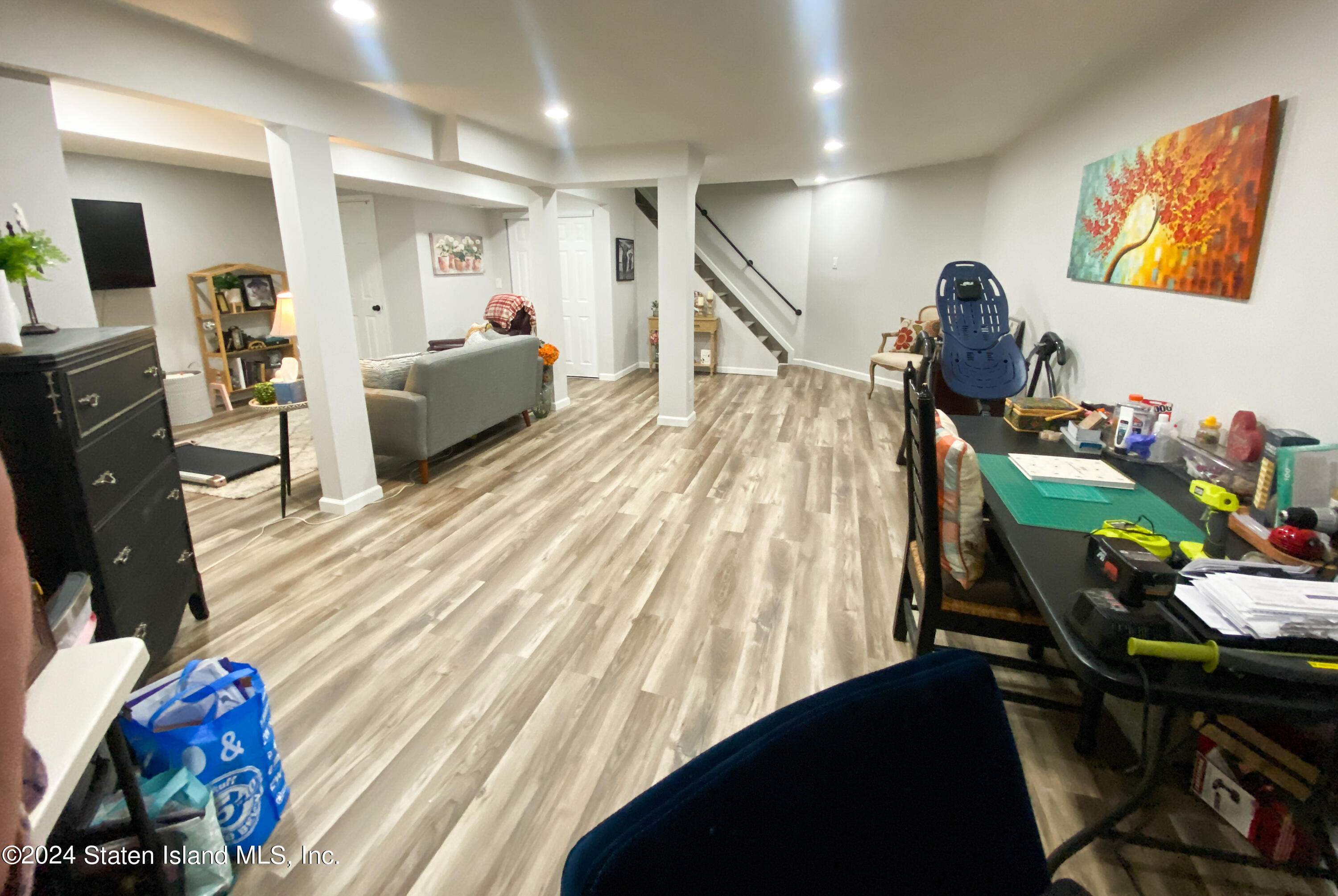 1440 Forest Hill Road, Unit 2 Staten Island, NY 10314 - Photo 22 of 32 a bedroom with furniture and a bed