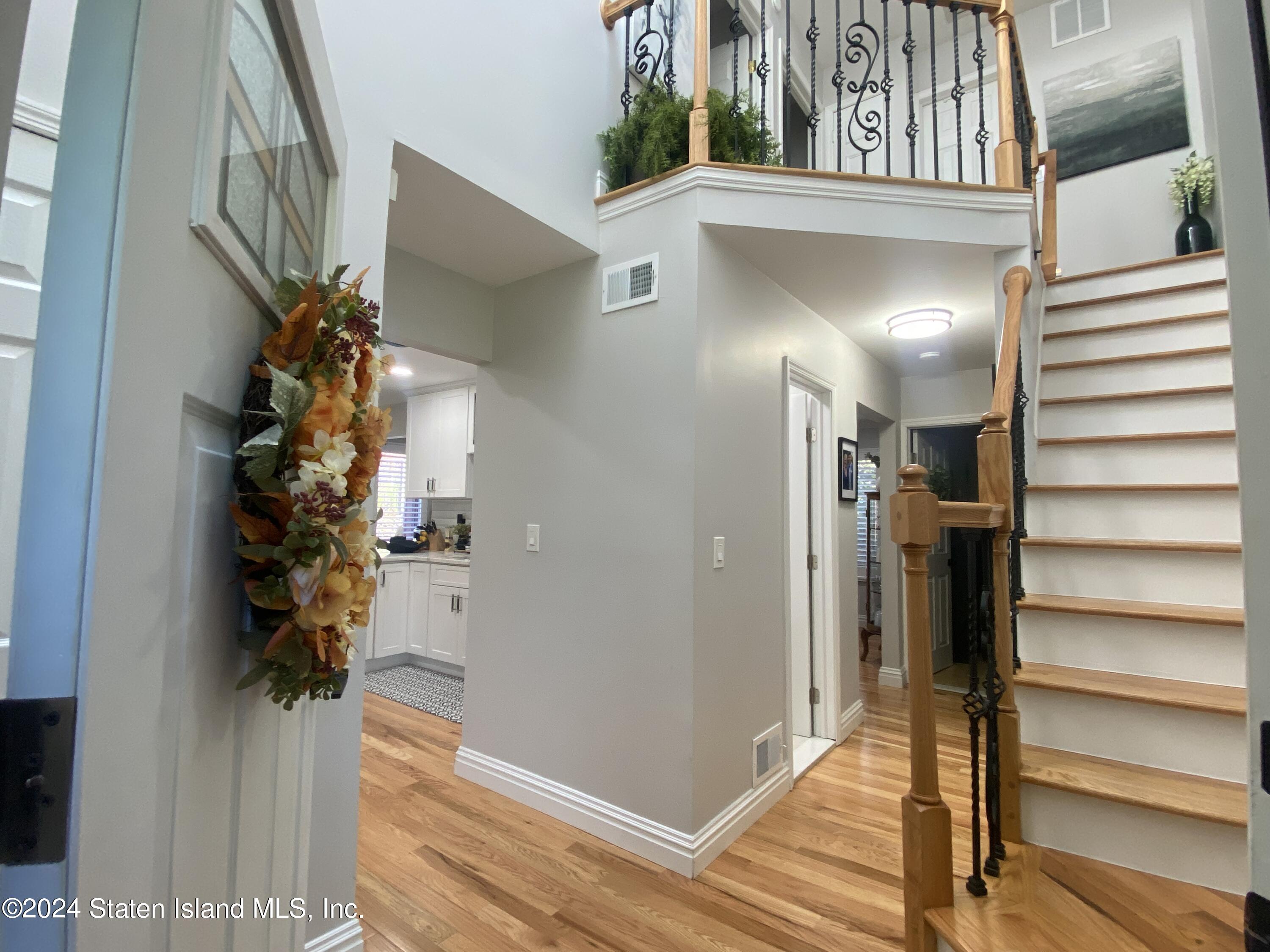 1440 Forest Hill Road, Unit 2 Staten Island, NY 10314 - Photo 4 of 32 a view of entryway with wooden floor
