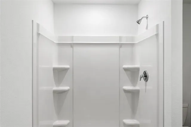 a close view of a shower in the bathroom