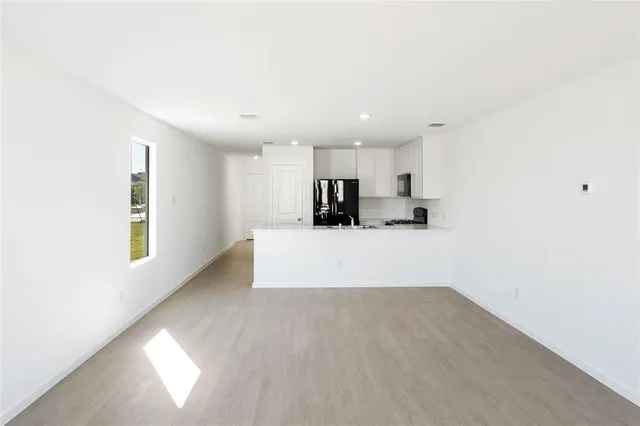a view of kitchen and window