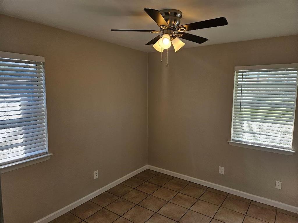 3511 Casa Ridge Drive Mesquite, TX 75150 - Photo 20 of 29 a view of a small space with wooden floor and a window
