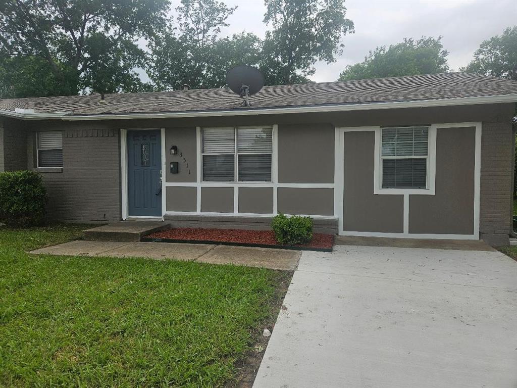 3511 Casa Ridge Drive Mesquite, TX 75150 - Photo 2 of 29 a front view of a house with a garden and yard