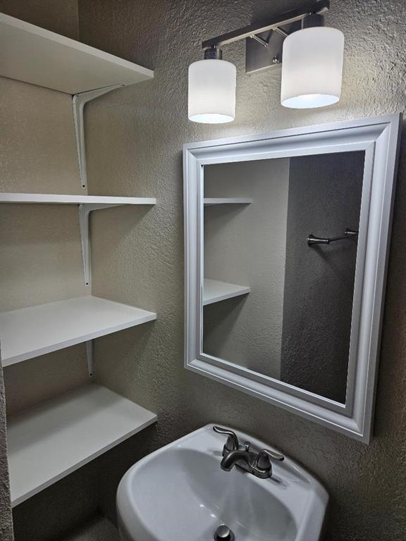 3511 Casa Ridge Drive Mesquite, TX 75150 - Photo 26 of 29 a bathroom with a sink and a toilet