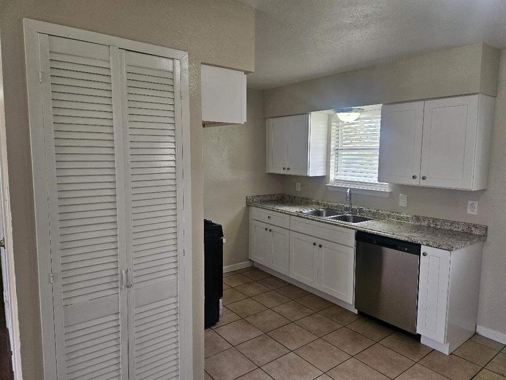 3511 Casa Ridge Drive Mesquite, TX 75150 - Photo 5 of 29 a kitchen with a sink cabinets and window