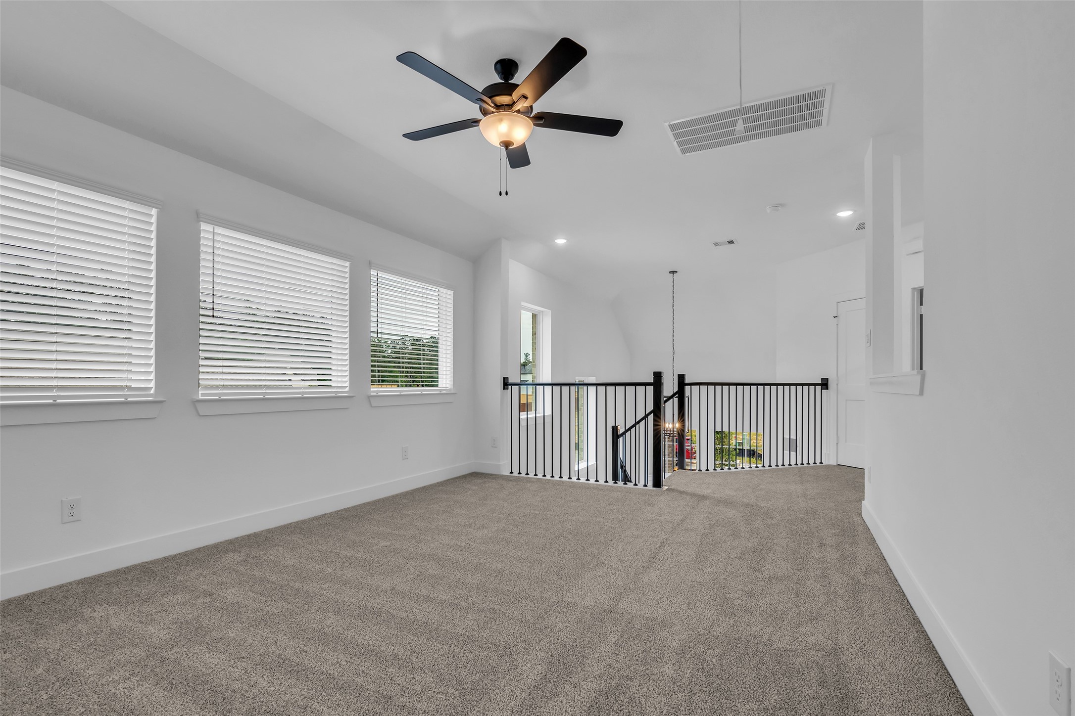 12853 Meadow Wind Way Conroe, TX 77302 - Photo 38 of 47 another view of upstairs living space/game room.