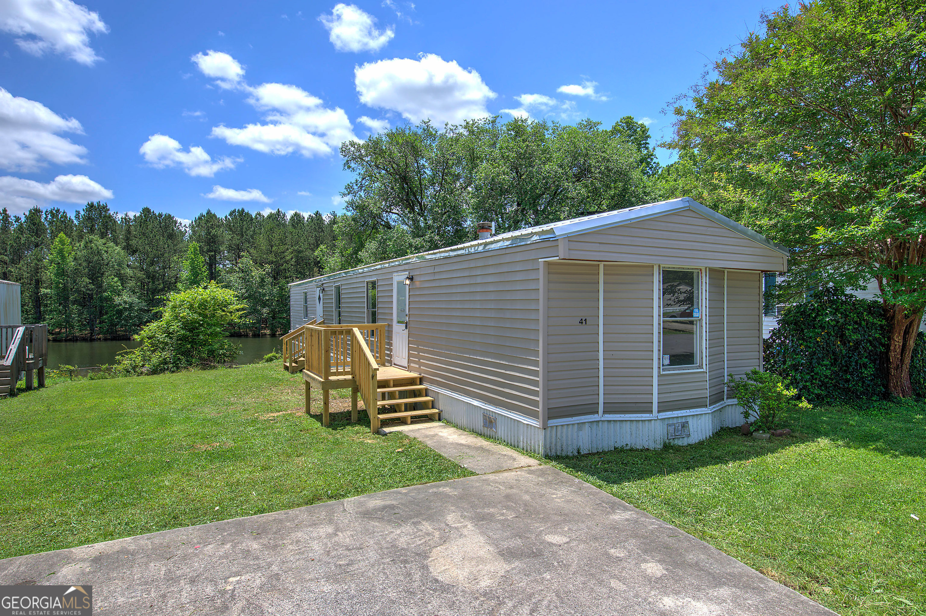 41 Tency Lane Northeast Rome, GA 30165 - Photo 1 of 1 a view of a house with a yard
