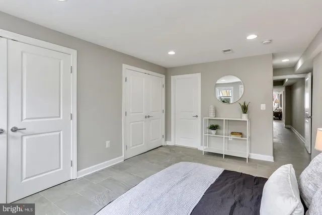 a view of storage and utility room with closet