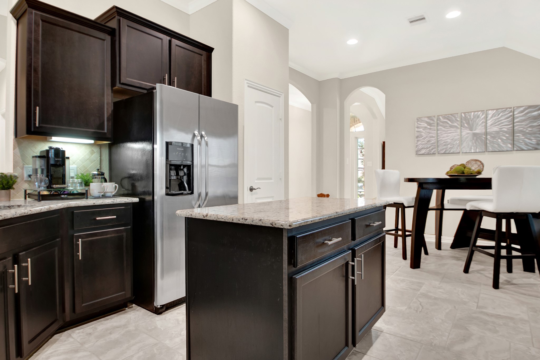 3864 Oakmist Bend Lane Spring, TX 77386 - Photo 14 of 38 a kitchen with stainless steel appliances a sink stove and cabinets