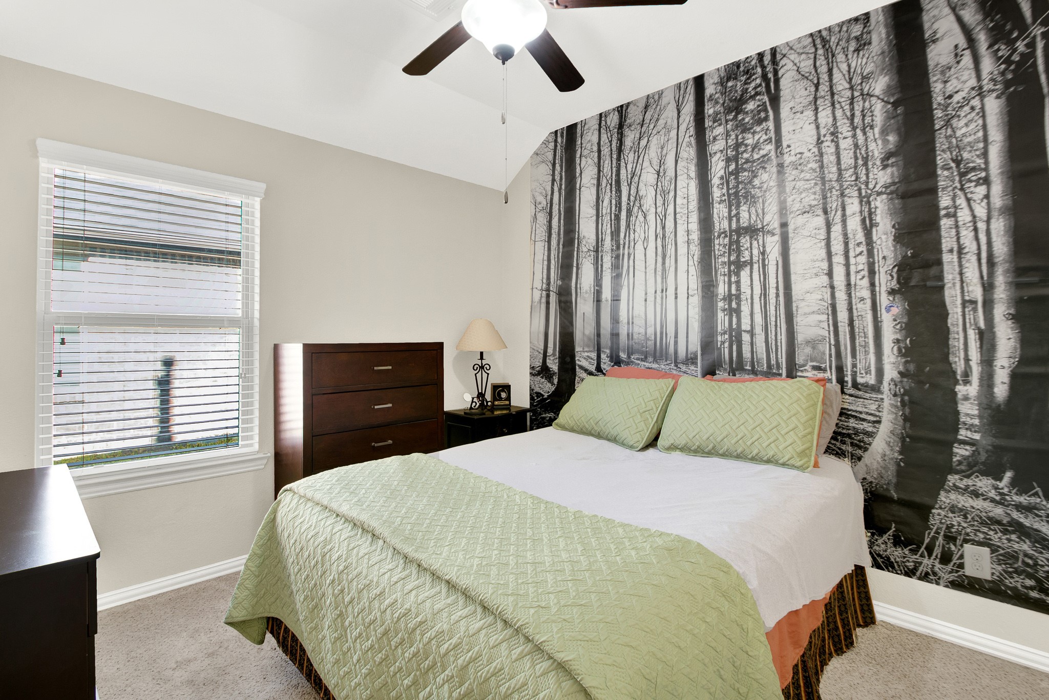3864 Oakmist Bend Lane Spring, TX 77386 - Photo 29 of 38 a bedroom with a bed and window