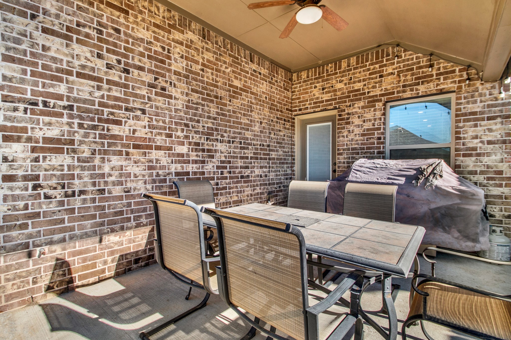 3864 Oakmist Bend Lane Spring, TX 77386 - Photo 33 of 38 a balcony with a table and chairs