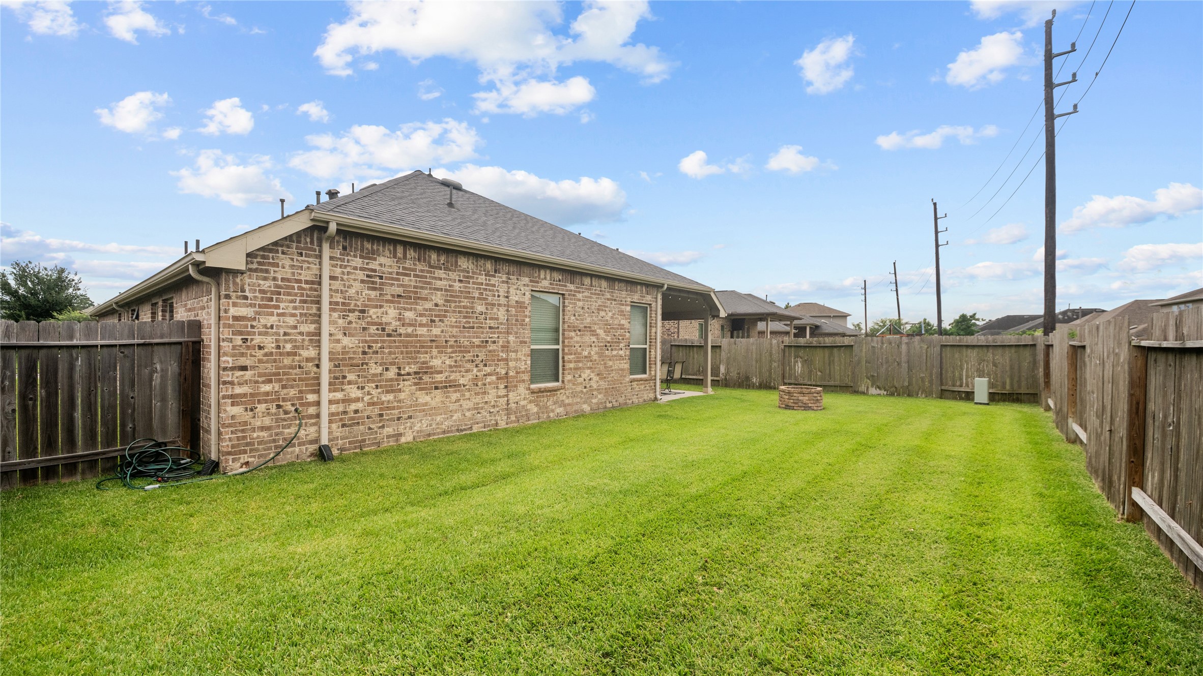 3864 Oakmist Bend Lane Spring, TX 77386 - Photo 35 of 38 a view of a backyard with wooden fence