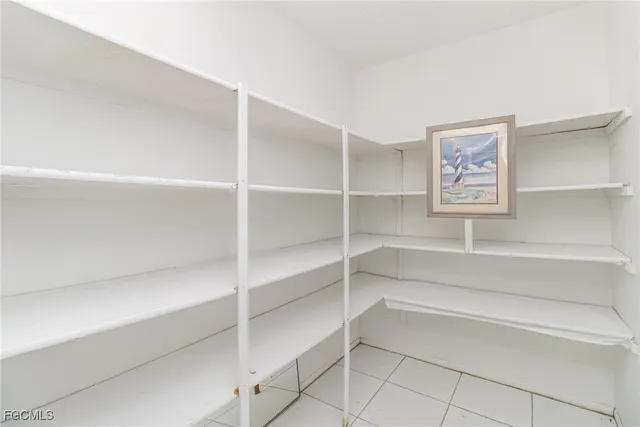 a bathroom with a shower and a glass door shower