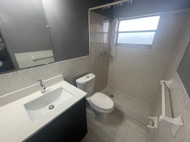 4725 Southwest 65th Avenue Davie, FL 33314 - Photo 10 of 14 a bathroom with a sink a toilet and shower