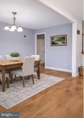 a view of livingroom with hardwood floor and a window