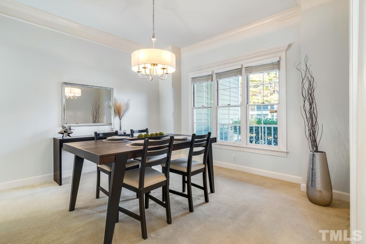 2116 Fountain Ridge Road Chapel Hill, NC 27517 - Photo 11 of 27 a view of a dining room with furniture window and outside view