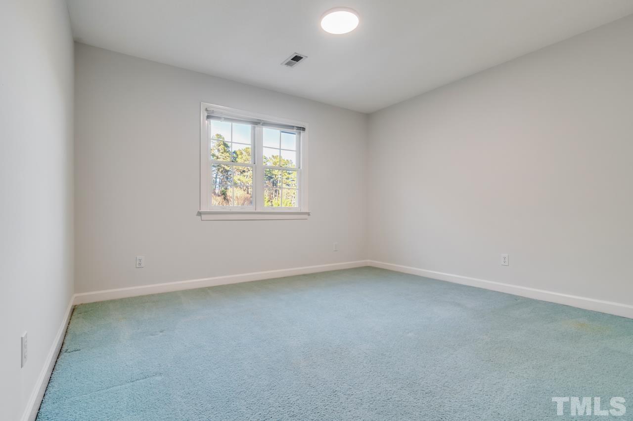 2116 Fountain Ridge Road Chapel Hill, NC 27517 - Photo 19 of 27 an empty room with a window